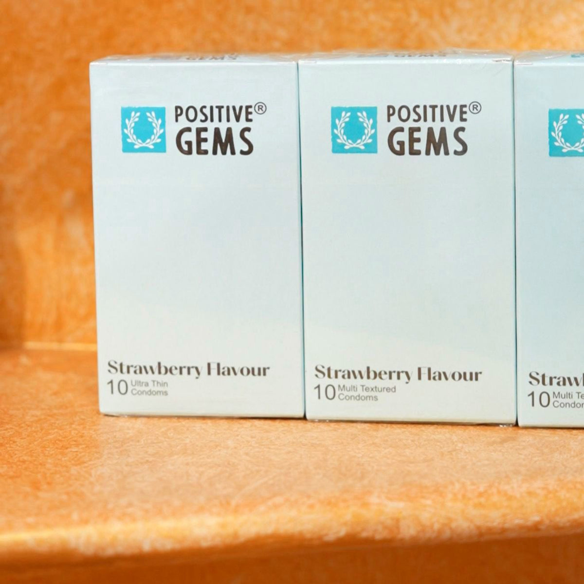 PositiveGems Strawberry Clear Condoms®
